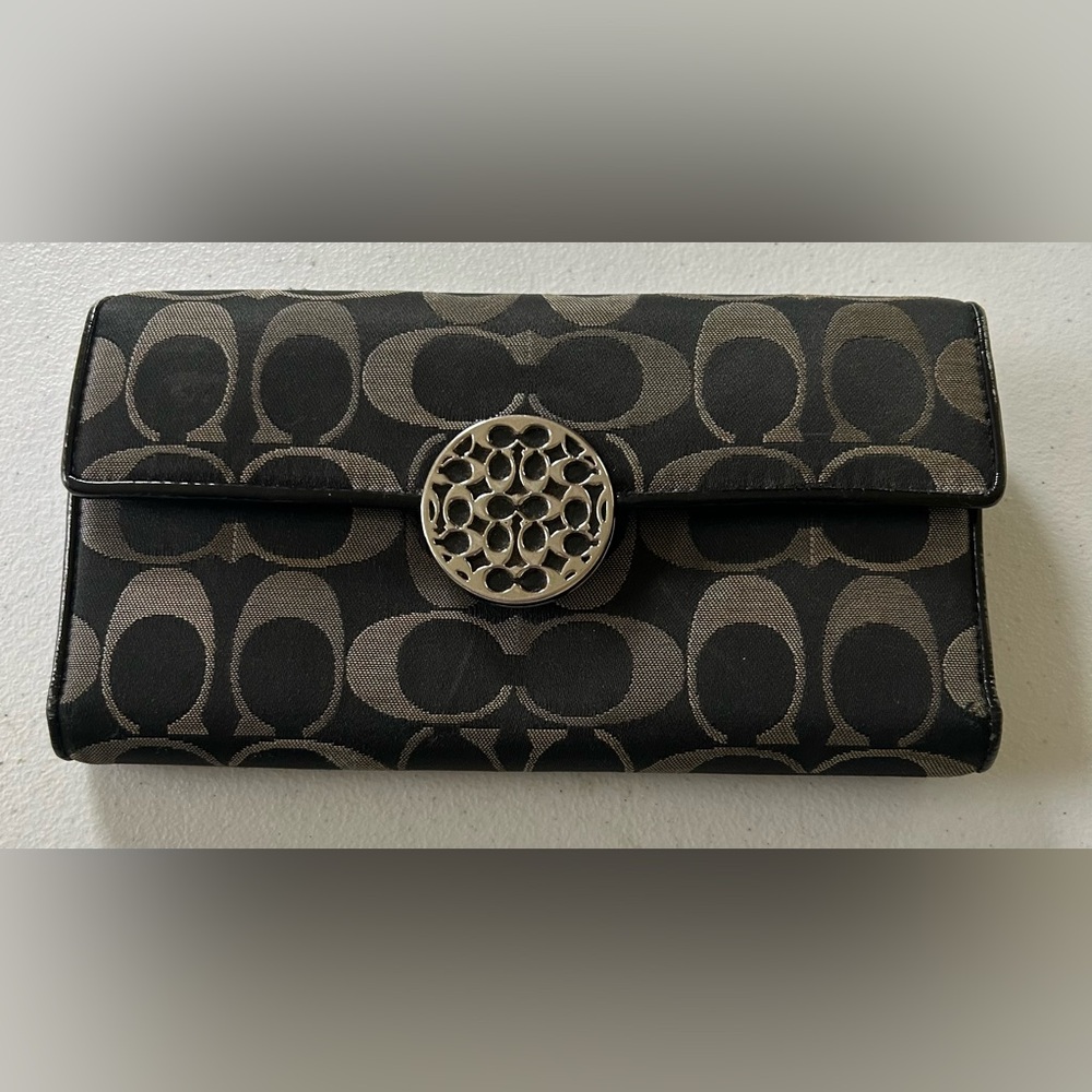 Coach Alexandra Signature Slim black and gray wallet.